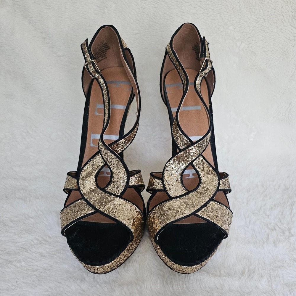 Elle Gold glitter heels with black straps and criss-cross design